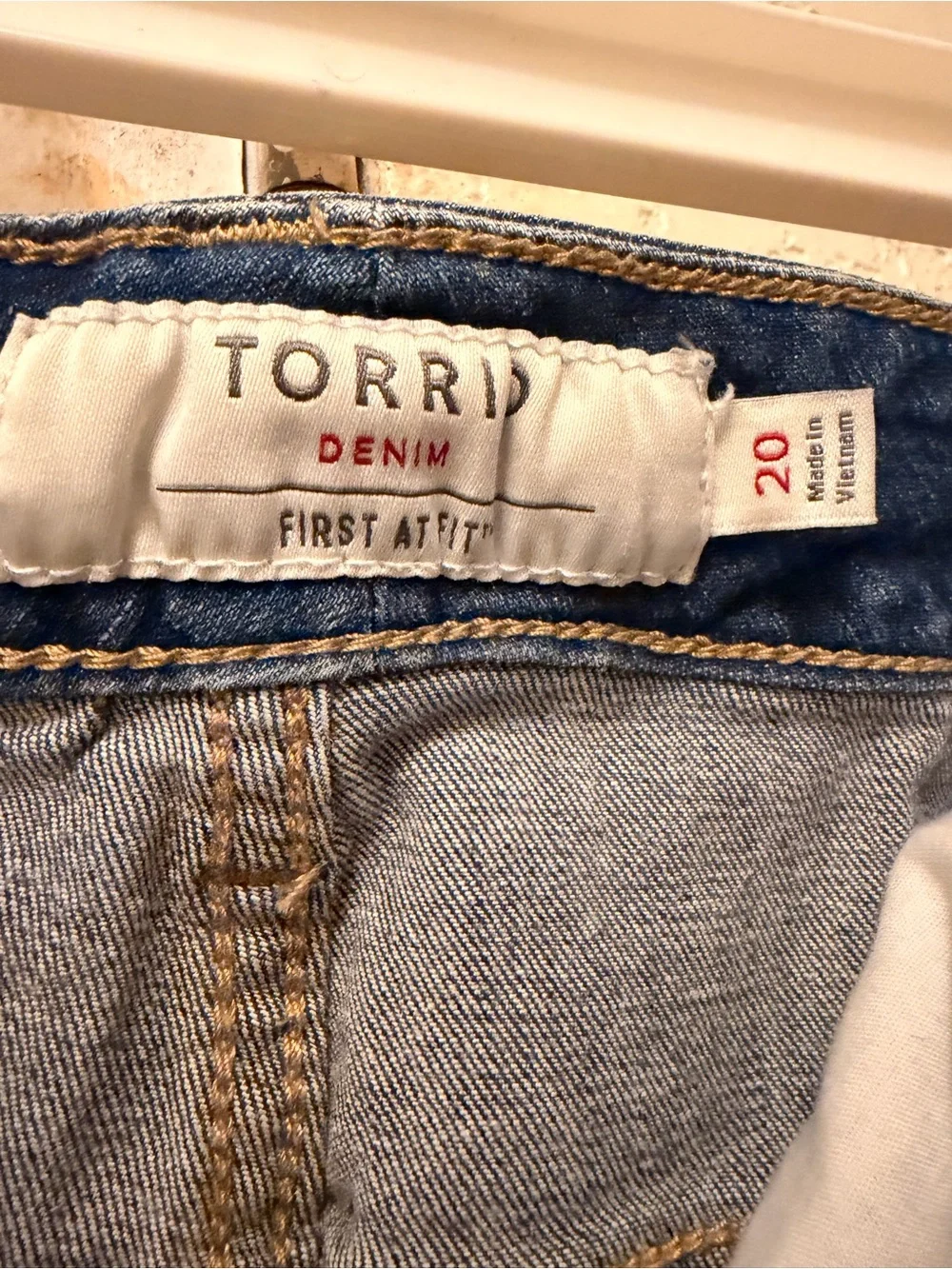 Torrid distressed jeans shorts with black flowy tank -